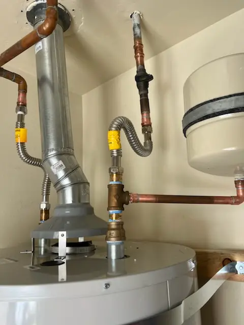 Water heater installation and plumbing repair in Jamaica Hills - Pond